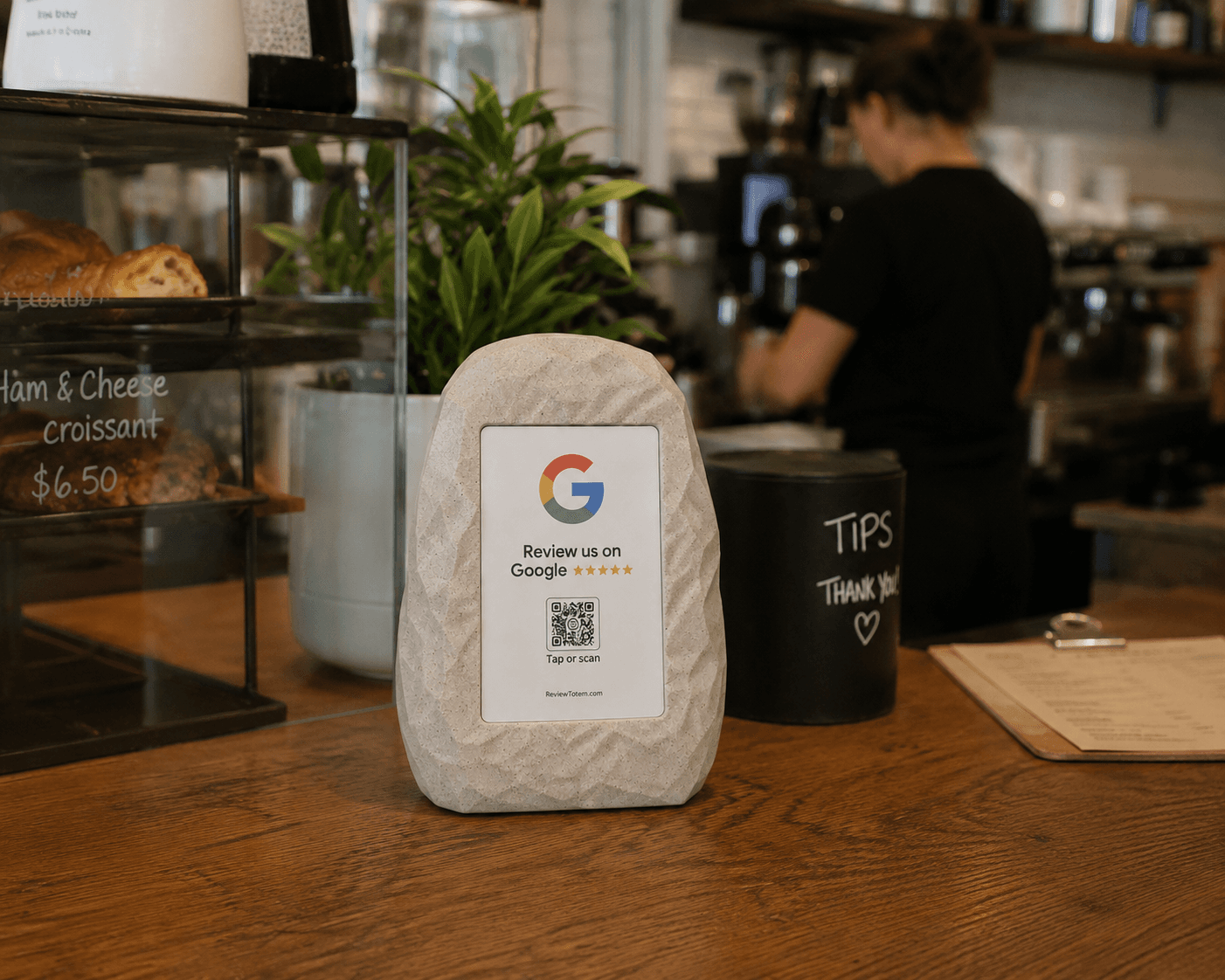 Tap Review on a café counter