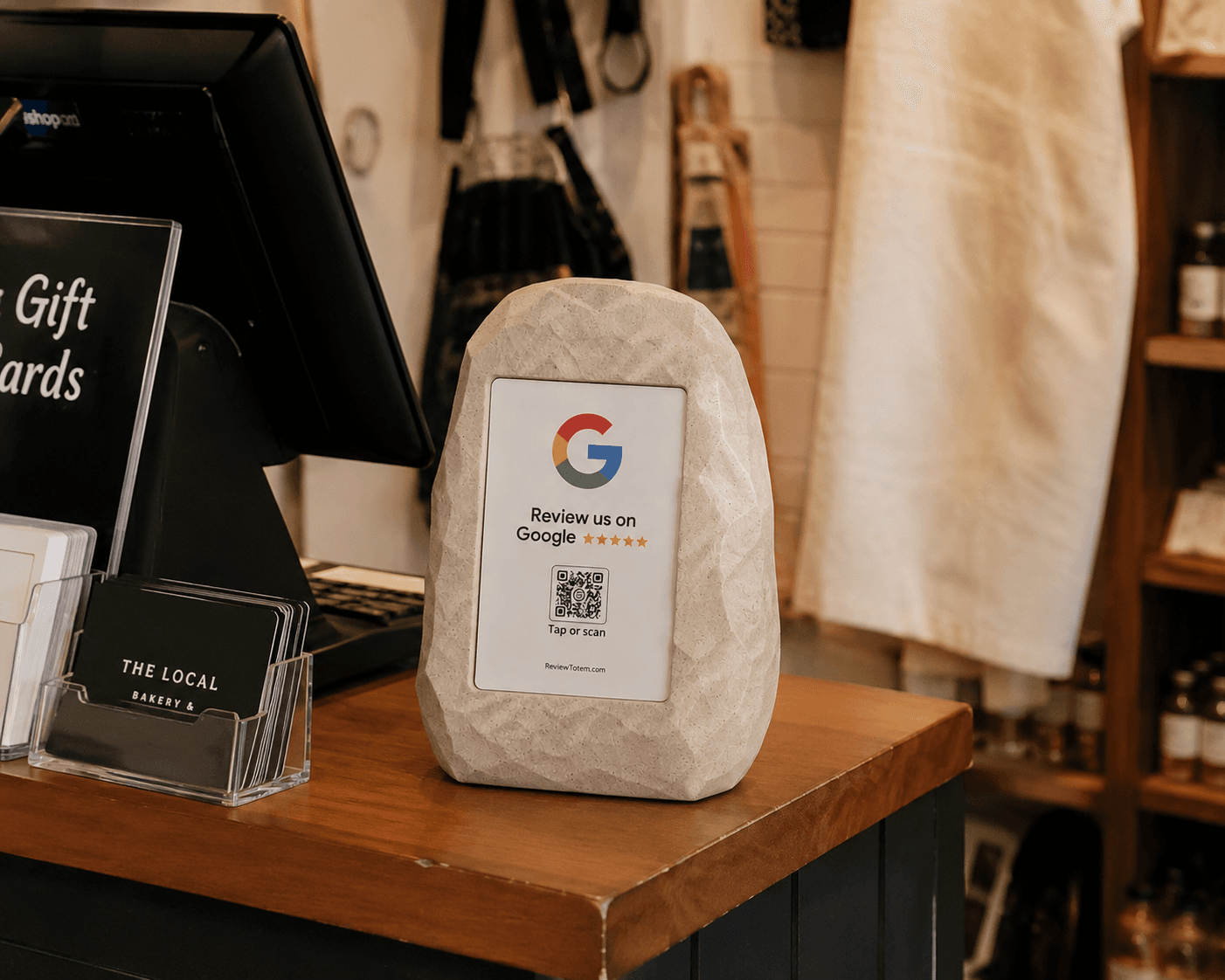 Tap Review on a boutique shop counter